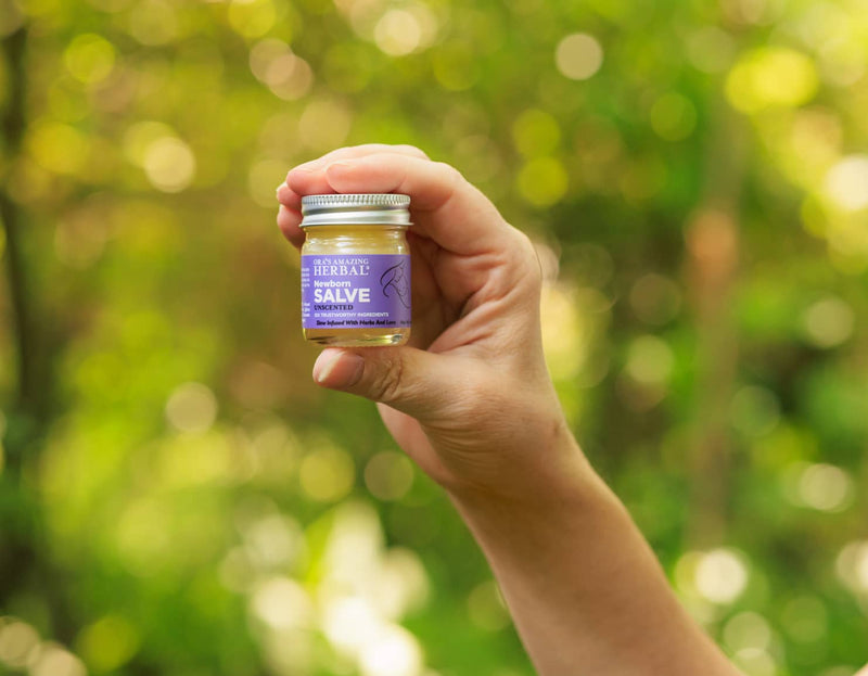 Newborn Salve 1oz Lifestyle Outdoor Human Hand