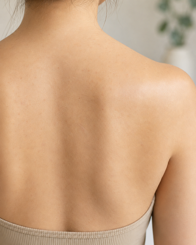 Back image a women with a clear skin