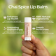 Chai Spice Benefits Infographic Hand Held By a Human Hand with Outdoor Background.