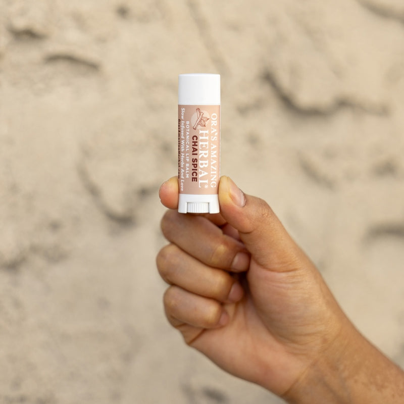 Chai Spice Lip Balm Lifestyle Outdoor Human Hand Wall