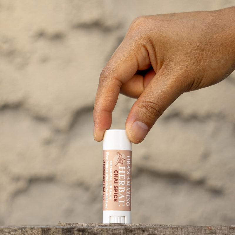 Chai Spice Lip Balm Lifestyle Outdoor Human Hand Wall