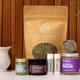 New Mama Gift Set with Tea Set Lifestyle Indoor Wood Background Front of Tea Bag Square