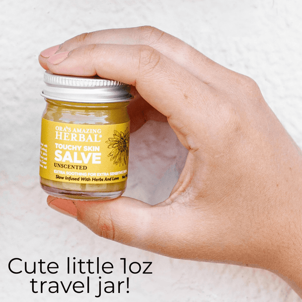 Touchy Skin Salve 1oz Lifestyle Indoor in Human Hand Cute Little Travel Jar