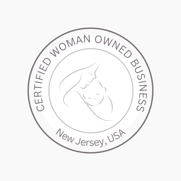 A circular gray seal on a white background reading 'CERTIFIED WOMAN OWNED BUSINESS' around the edge and 'New Jersey, USA' at the bottom, with a simple mother-and-child line drawing in the center.