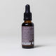 Advanced Nightly Skin Repair Face Oil Serum White Background with Shadows Ingredients Back Label 1oz Bottle