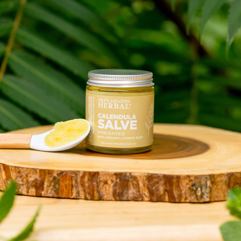 Calendula Cream Salve 4oz Lifestyle Outdoor Texture Calendula Cream Salve and Calendula Oil Set