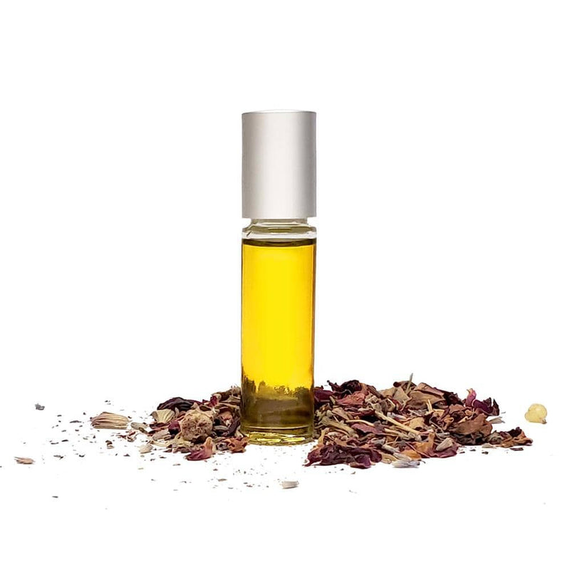 Grounded Grove Perfume Oil Standing with Herbs White Background 0.3oz Roller