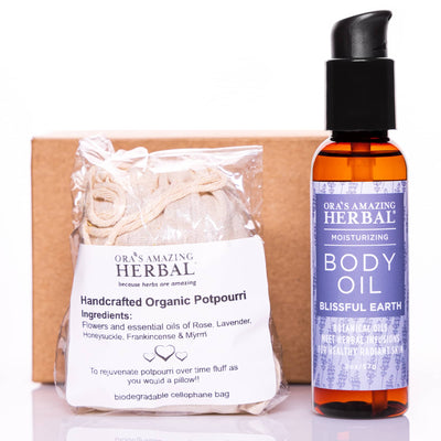 Potpourri and Blissful Earth Body Oil Set with Box and Cellophane White Background